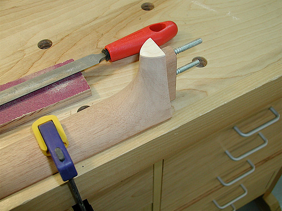 Filing Heel Cap